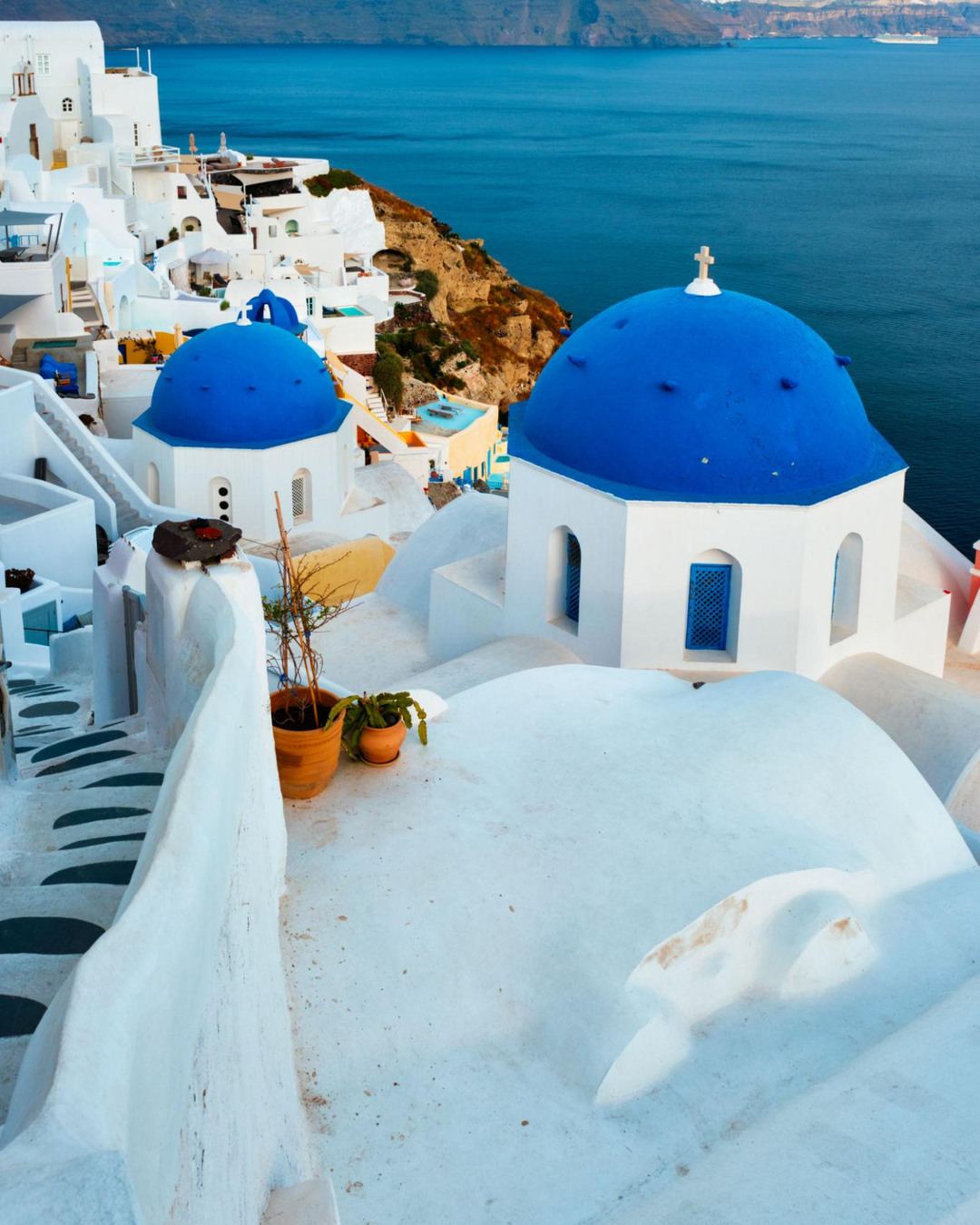 Blue-domed churches overlooking the Aegean in Santorini