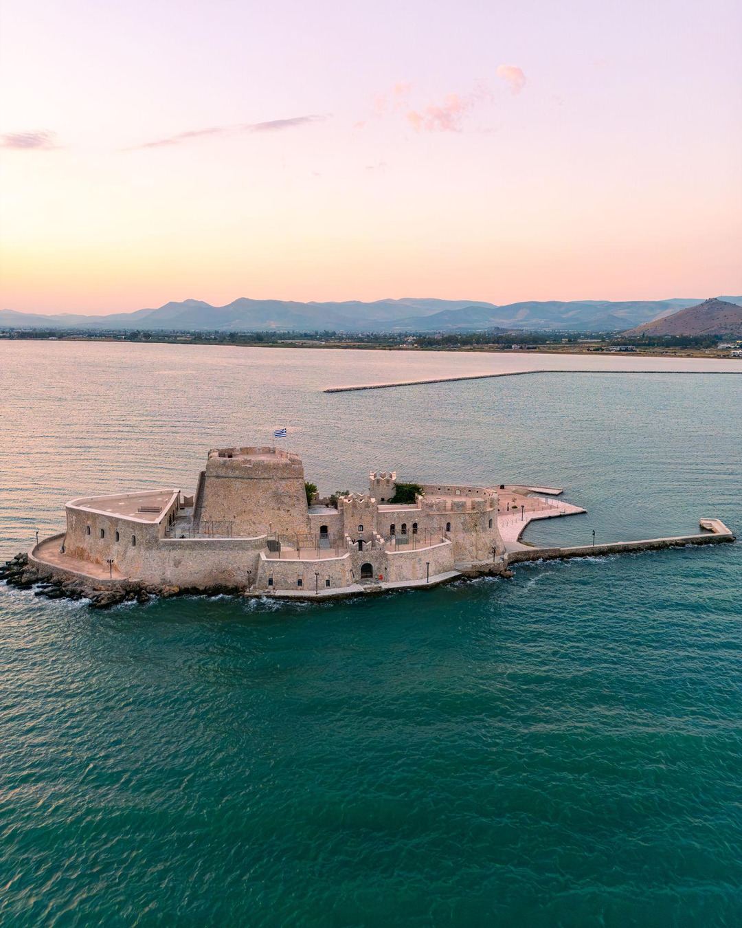 Bourtzi Castle in the Argolic Gulf off Nafplio at sunset