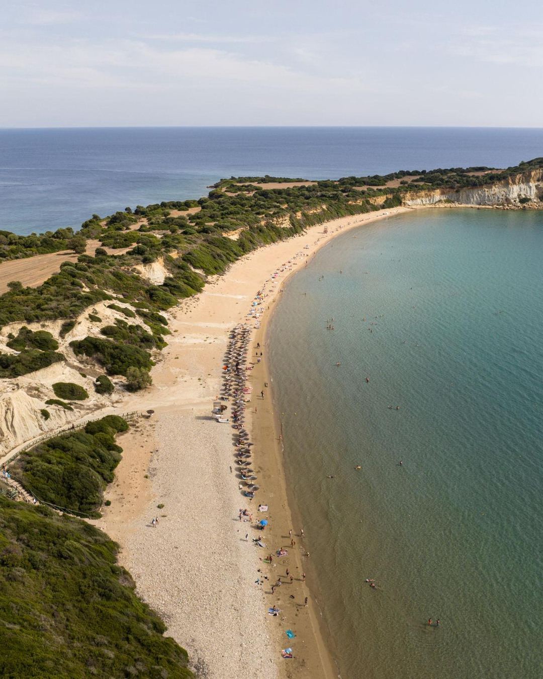 A long golden beach curving along the coast of Zante